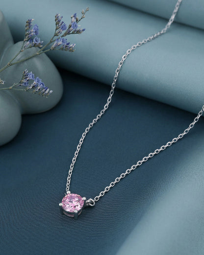 Rhodium Plated Dangling Pink Solitaire Necklace